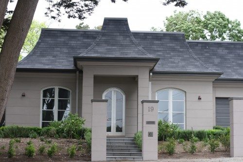 Budget-friendly option for sheds and garages Classic 3-tab asphalt shingles close up